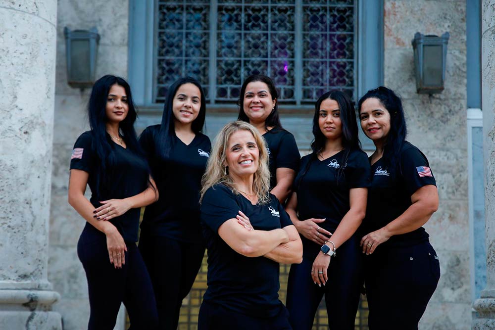 home cleaning checklist on paper with supplies